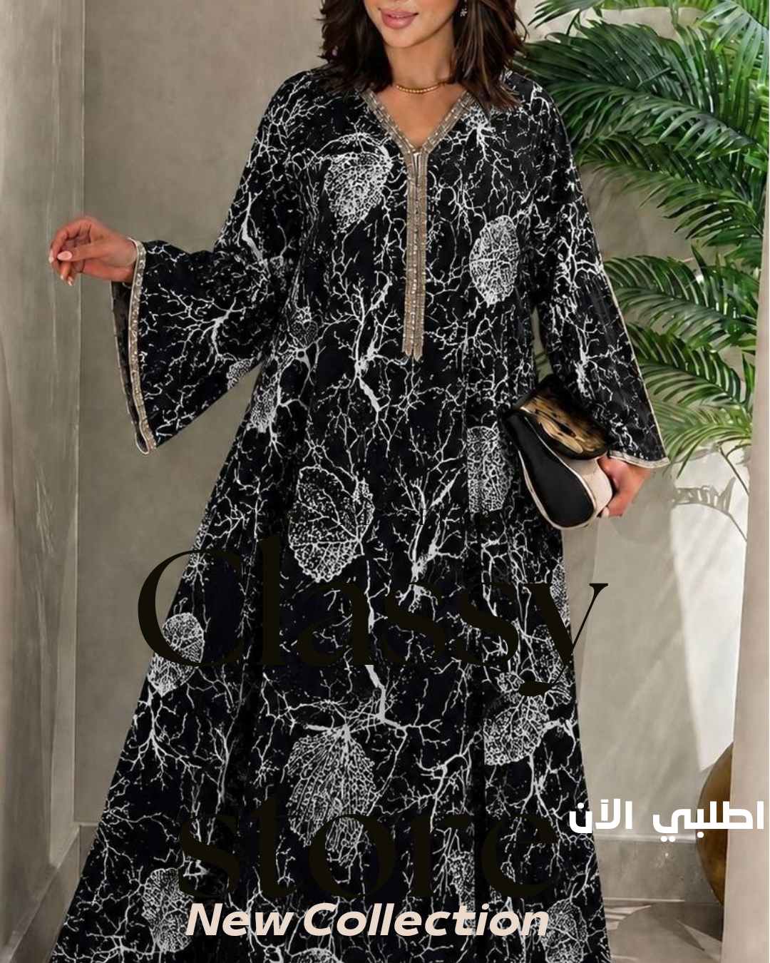 عباية أورجانزا فسكوز مستورد مطرزة نسائية باللون الأسود والأبيض من Classy Woman