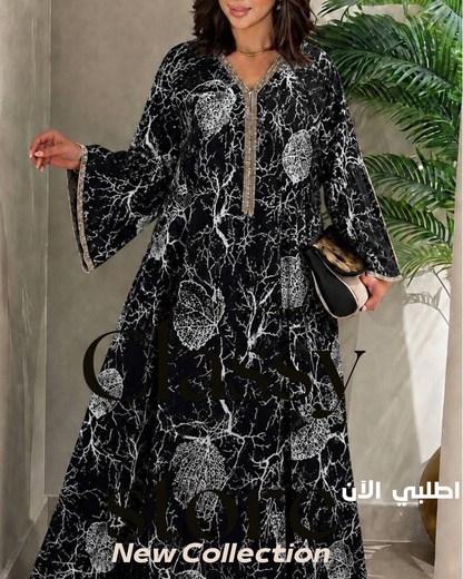 عباية أورجانزا فسكوز مستورد مطرزة نسائية باللون الأسود والأبيض من Classy Woman